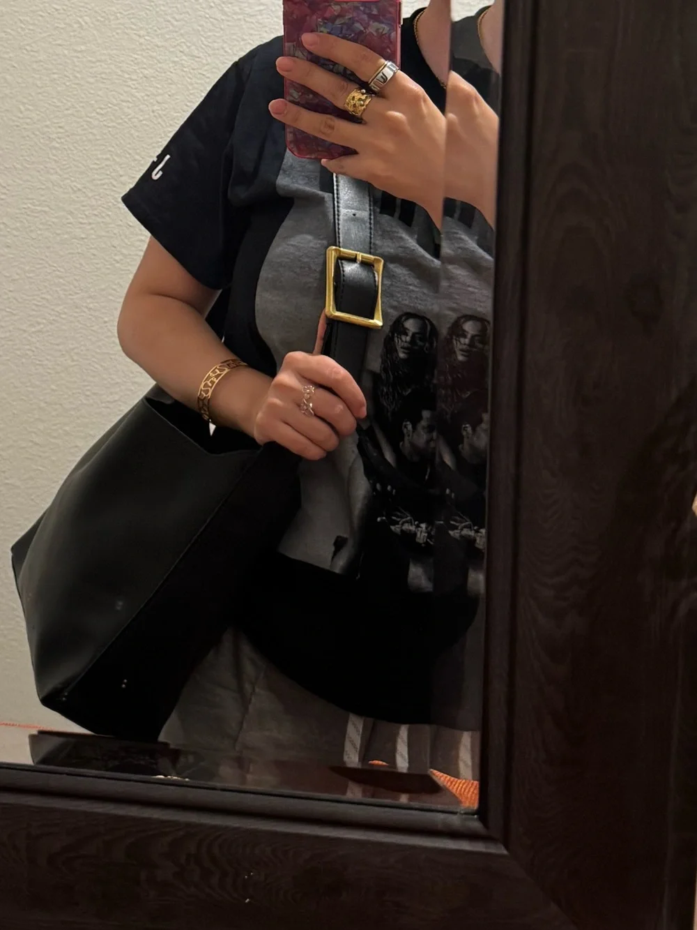 Elegant Black Leather Shoulder Bag with Gold Buckle